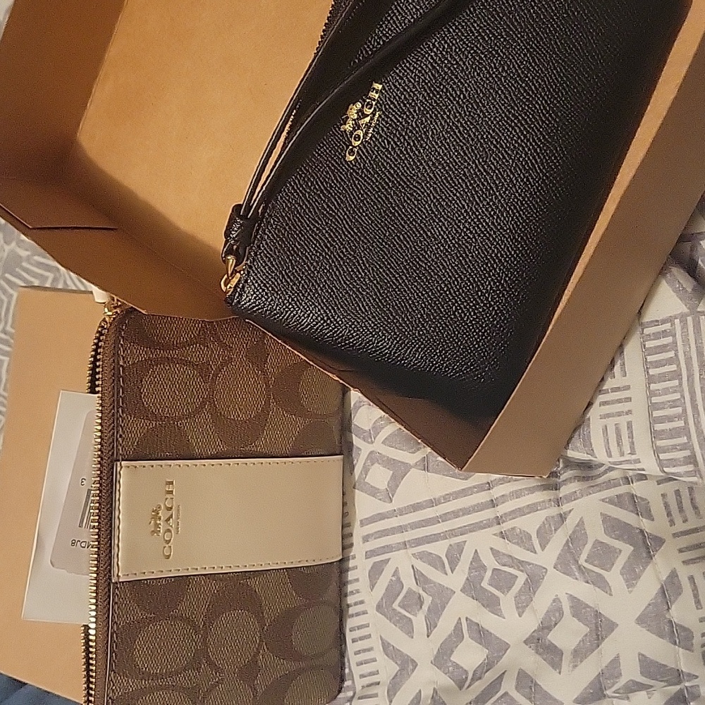 2 coach wristlets